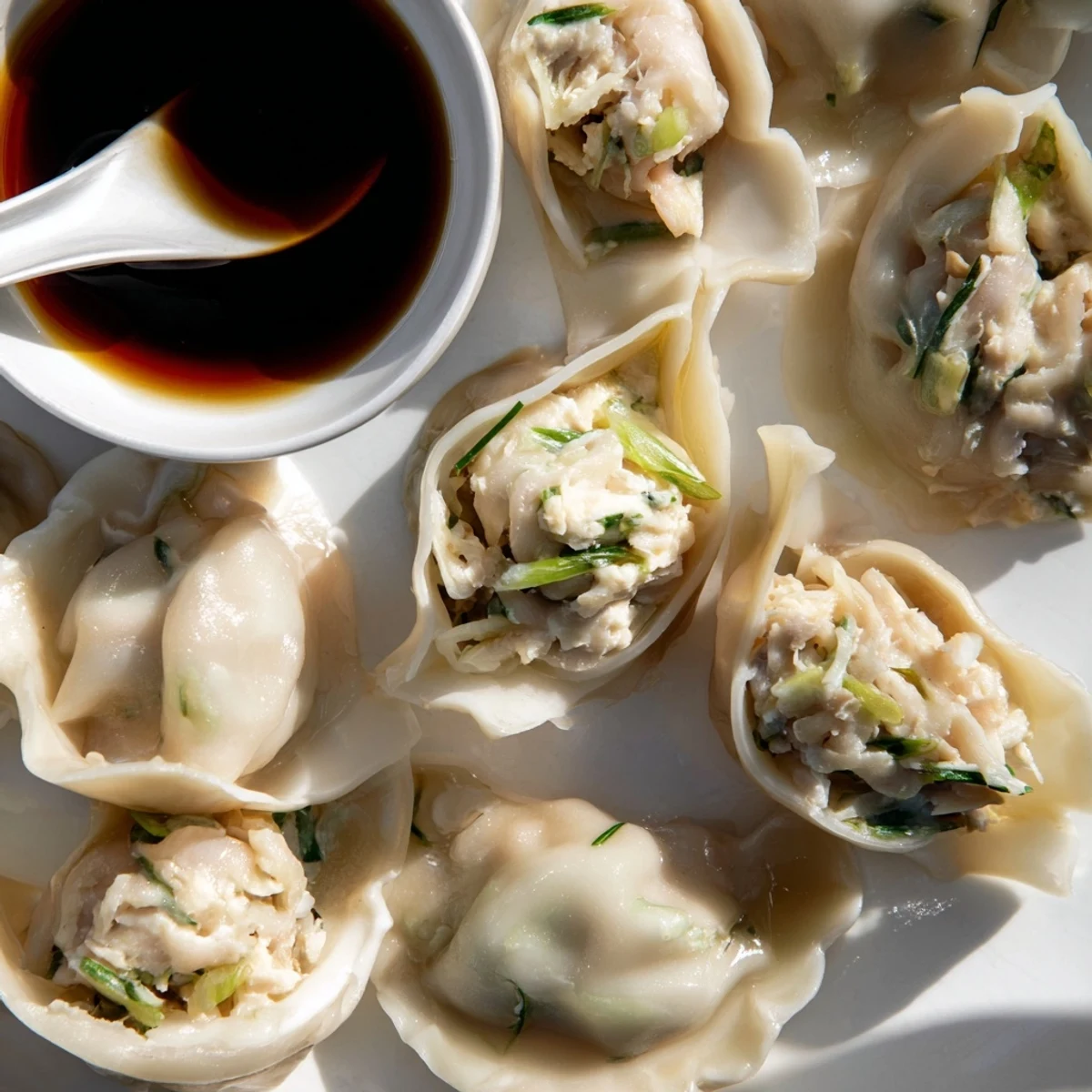 Tender dumplings filled with shrimp and creamy cheese, perfect for a cozy dinner.