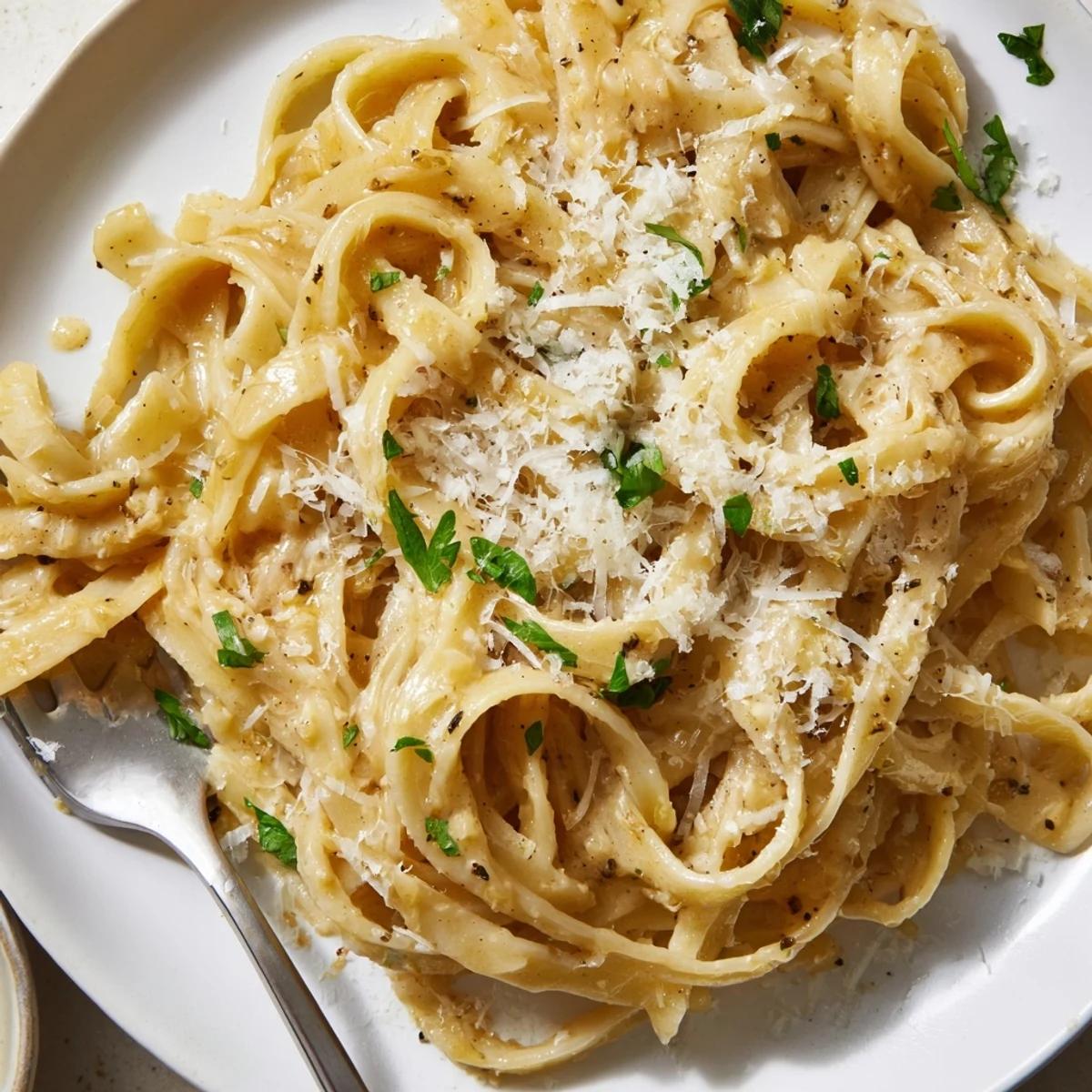 Savory Garlic Browned Butter Noodle Bowls drizzled with golden brown butter and parmesan.