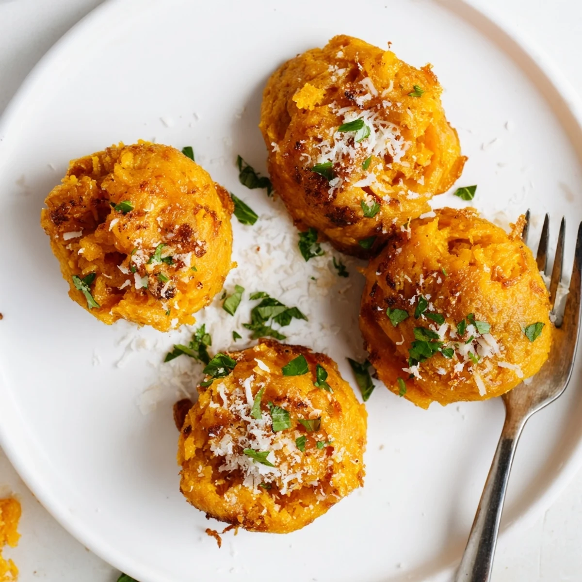 Golden-brown Garlic Parmesan Sweet Potato Puffs, fluffy inside and packed with flavor.