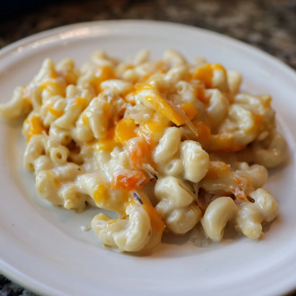 Hearty One-Pot Butternut Squash Mac & Cheese, with tender pasta, vibrant orange squash, ready to eat.