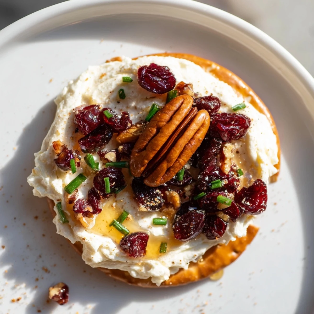 Festive Rocket Fuel New Years Eve Treats topped with pecans and spicy jalapeños for a delicious appetizer.