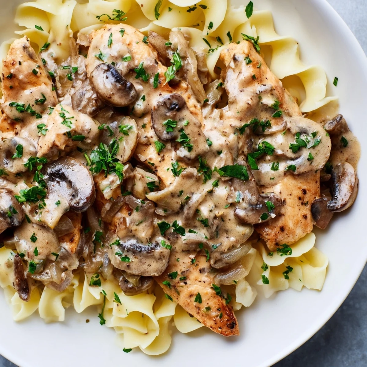 Creamy, flavorful Chicken and Mushroom Stroganoff with tender chicken and buttery egg noodles.