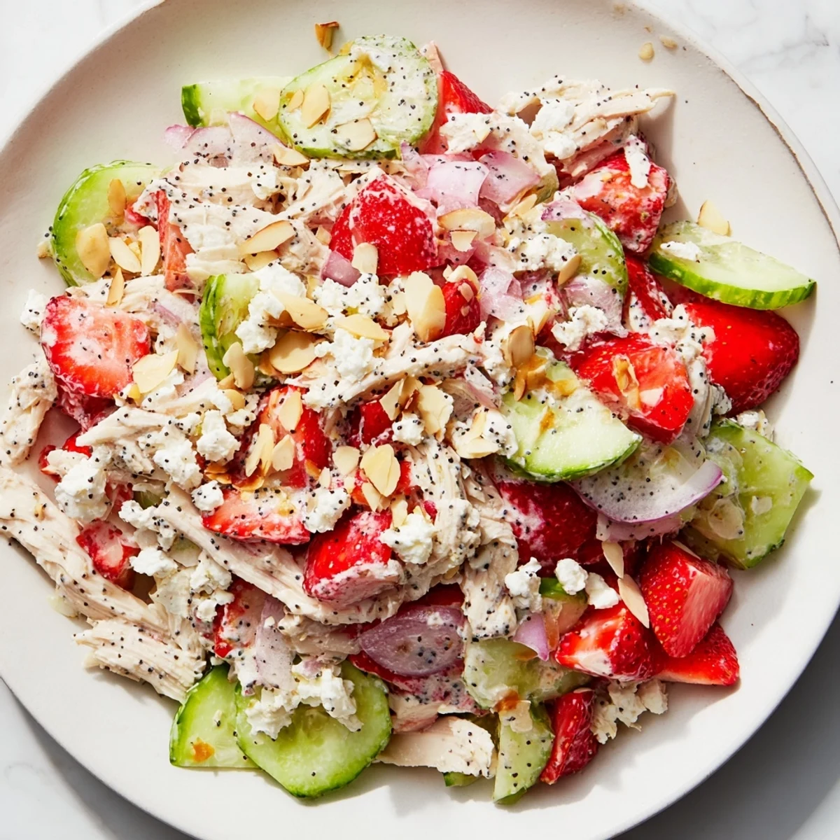Fresh Strawberry Poppy Seed Chicken Salad with vibrant red strawberries and creamy dressing.