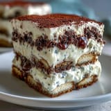 Delicious black sesame tiramisu, artfully chilled with a dusting of seeds.