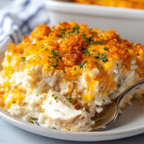 A plate of chicken and rice casserole.