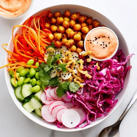 A colorful ASMR Crunch Snack Bowl filled with vibrant vegetables and crunchy toppings.  