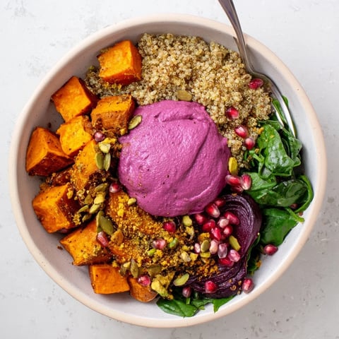 Colorful spiced winter bowls filled with roasted veggies and ube-coconut purée.  
