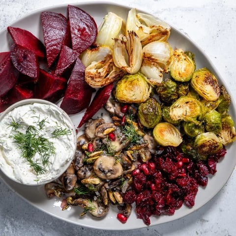 Vibrant Pine Forest Winter Mezze Board, showcasing roasted vegetables, creamy labneh, and festive garnishes.
