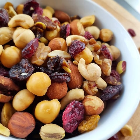 Vibrant pile of Easy Party: Assorted Nuts and Dried Fruit, ready for a quick and delicious snack.