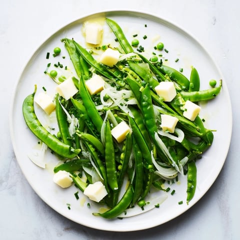 Fresh, vibrant The English Ivy salad with snap peas, green beans and white cheddar; perfect for summer.