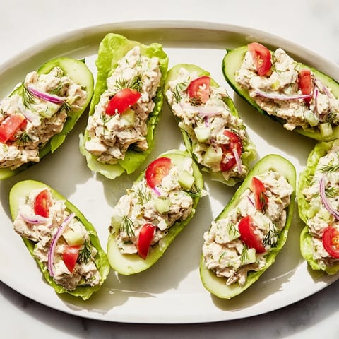 Juicy chicken salad overflows from the pickle halves of this flavorful Pickle Sandwich.