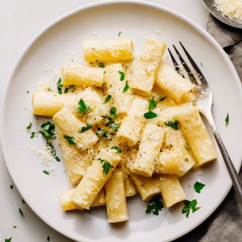 Homemade creamy milk pasta one-pot, a comforting bowl of pasta in a luscious, milky sauce.