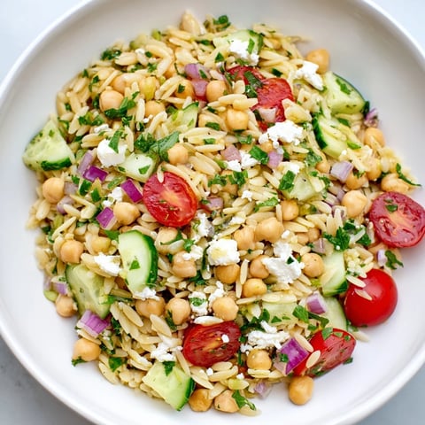 Lemony Chickpea Orzo Salad: A bright, refreshing salad featuring tender orzo and zesty lemon dressing.