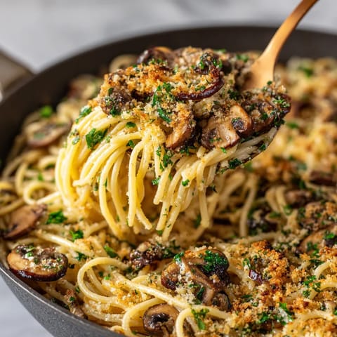 A close up of a brown butter mushroom pasta dish.