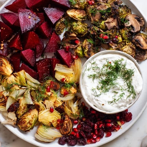 A close-up of a Pine Forest Winter Mezze Board, brimming with colorful, flavorful Mediterranean delights.