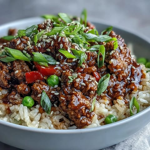 Savory Simple High Protein Beef Bowl with colorful veggies, ready for dinner plates.