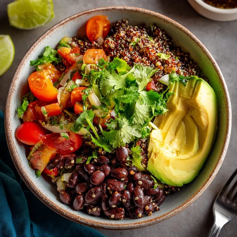 A bowl of quinoa and black beans.