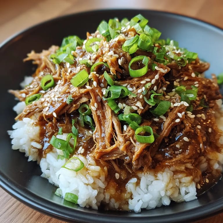 A plate of slow cooker Asian shredded pork.