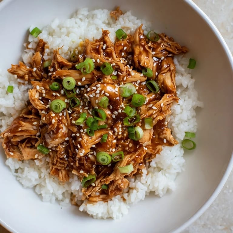 Flavorful slow cooker teriyaki chicken, a perfect weeknight dinner, paired with tender rice.
