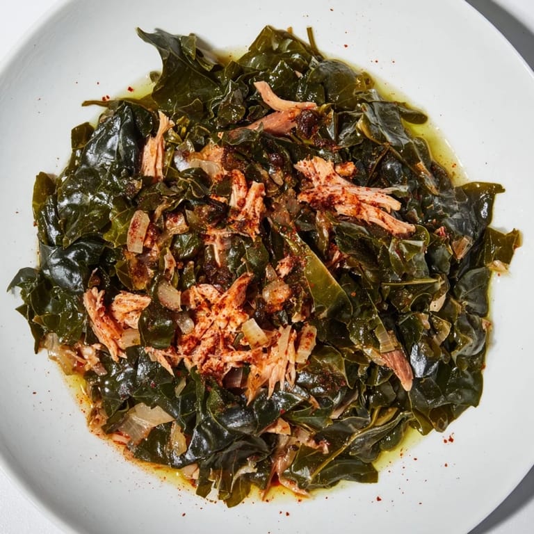 Hearty Southern style collard greens recipe featuring tender greens and savory smoked turkey, perfect for a side.