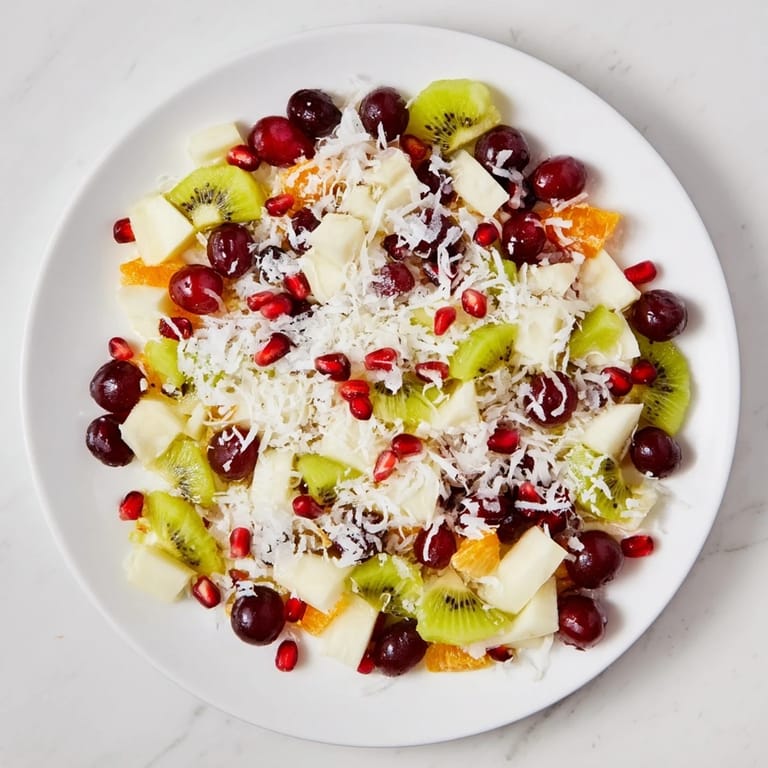 Imagine the textures: fresh fruit, honey-kissed, topped with coconut flakes in this Snowflake Fruit Medley.