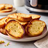 A plate of crispy air fryer frozen garlic bread.