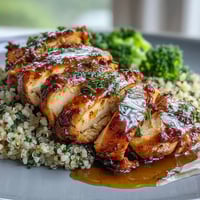 A healthy chicken quinoa meal prep bowl with juicy baked chicken, steamed broccoli, and fluffy quinoa—perfect for busy weekdays.