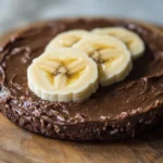 Healthy snack with almond butter and banana